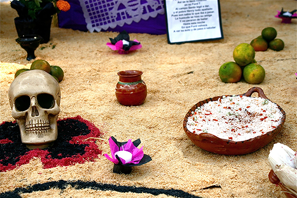 SKULL AND RICE decorate Dia de los Muertos festival in Mexico City. (Photo: Alejandro De la Cruz)