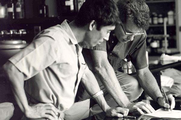 AKIRA TANAKA (left), head of IRRI’s Plant Physiology Department (1962-66), confers with the Institute's first breeder Peter Jennings during the early 1960s. Dr. Tanaka contributed to the development of IR8, the "miracle" variety that jump started the Green Revolution in rice. (Photo: IRRI)