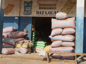 Rice vendors in Bouaké selling rice produced by M’bé farmers.