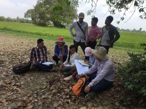 Participants from government institutions discuss the effectiveness of BCAs during the site visit.