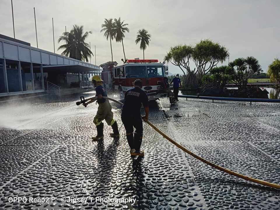 IRRI firefighters wash off ashfall from Taal that covered IRRI HQ. Although volcanic ash may cause devastating property damage and loss of life, it is rich in potassium, iron, magnesium, sodium, and calcium. Volcanic eruptions are part of the process that eventually creates the most fertile soil in the world. (Photo: © Jipsey Tandang)